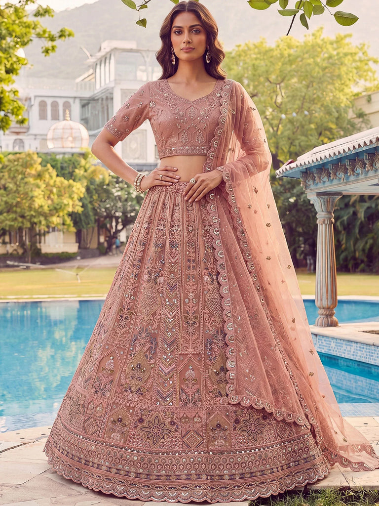 Glowing Peach Embroidered Net Wedding Wear Lehenga Choli with Dupatta
