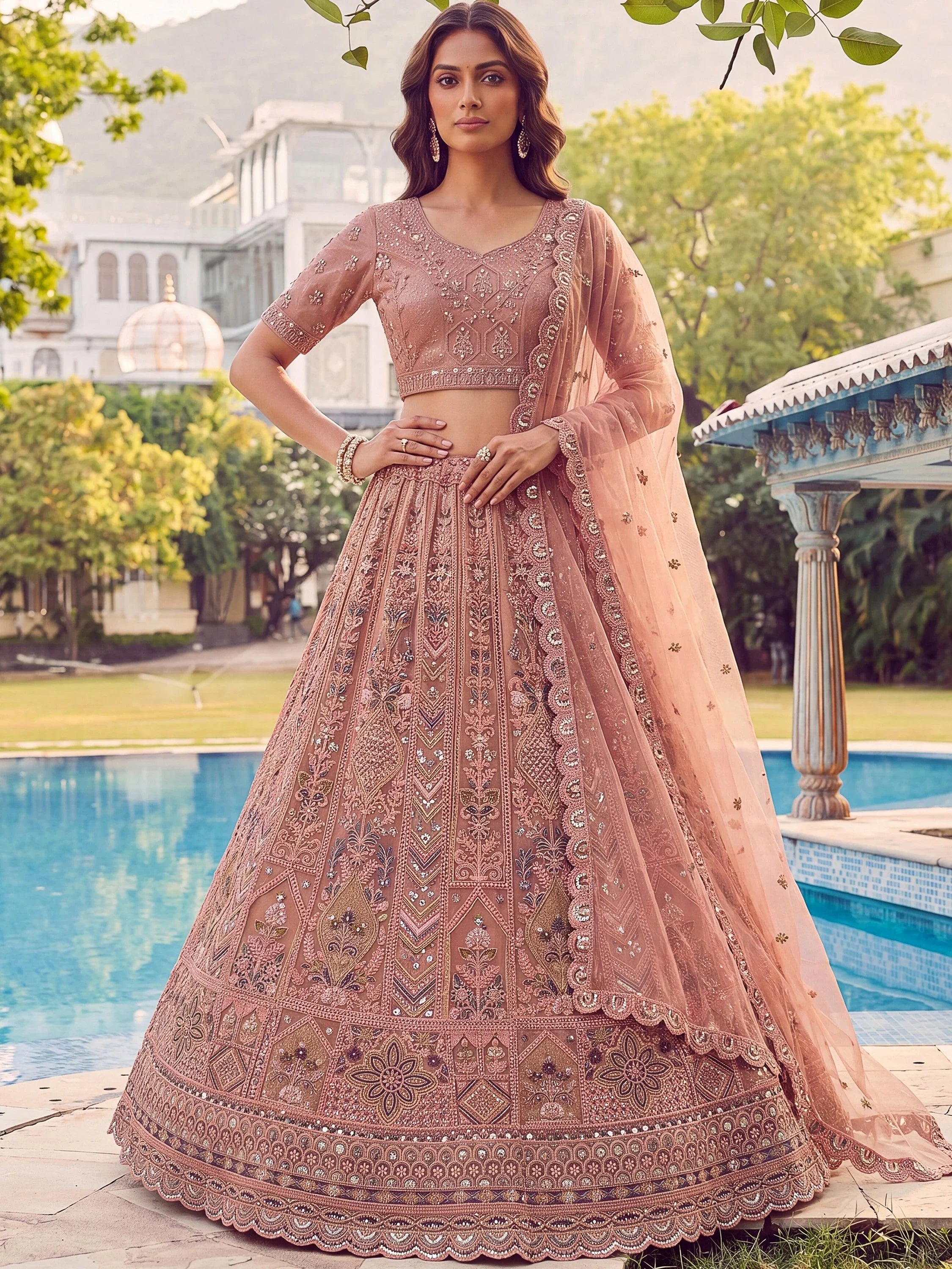 Glowing Peach Embroidered Net Wedding Wear Lehenga Choli with Dupatta
