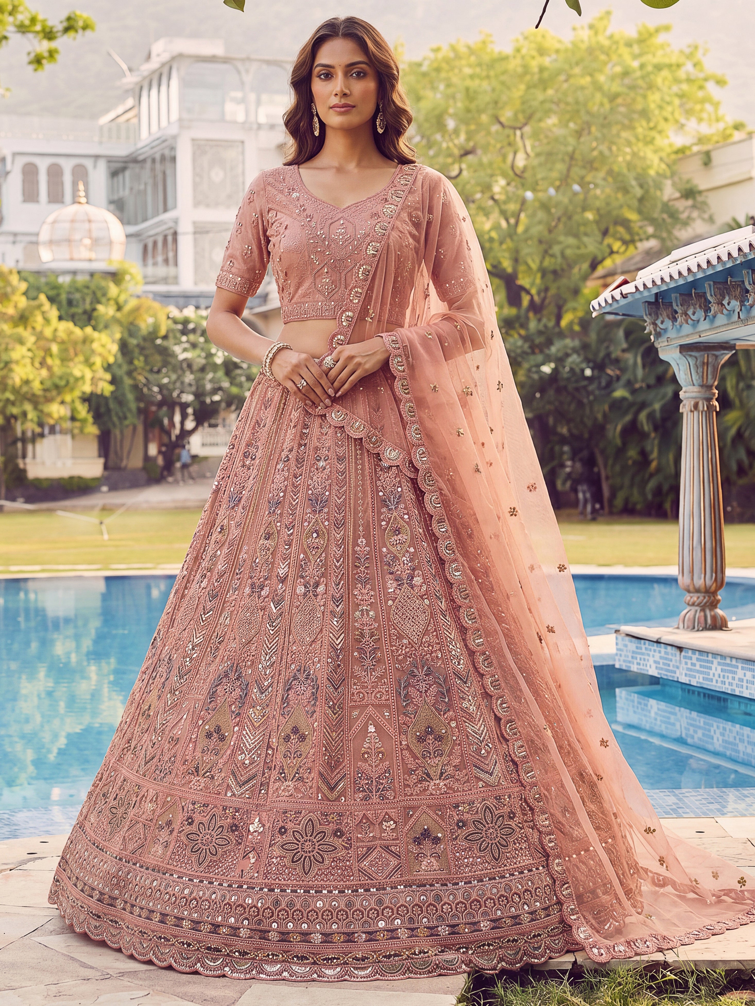 Glowing Peach Embroidered Net Wedding Wear Lehenga Choli with Dupatta