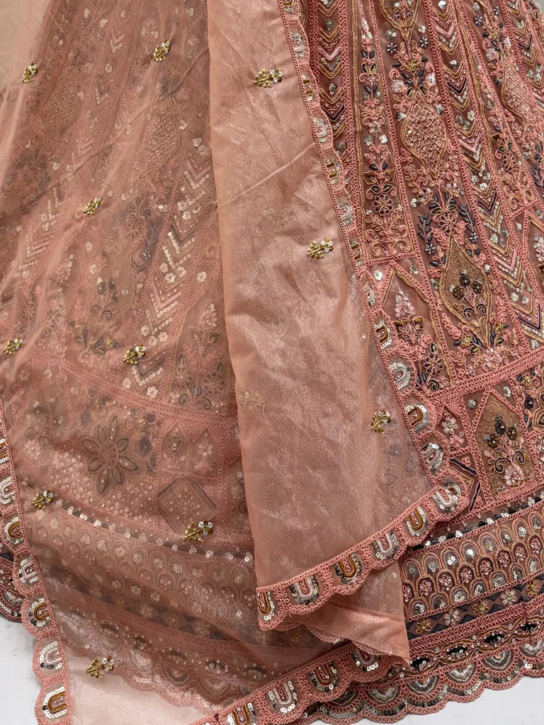 Glowing Peach Embroidered Net Wedding Wear Lehenga Choli with Dupatta