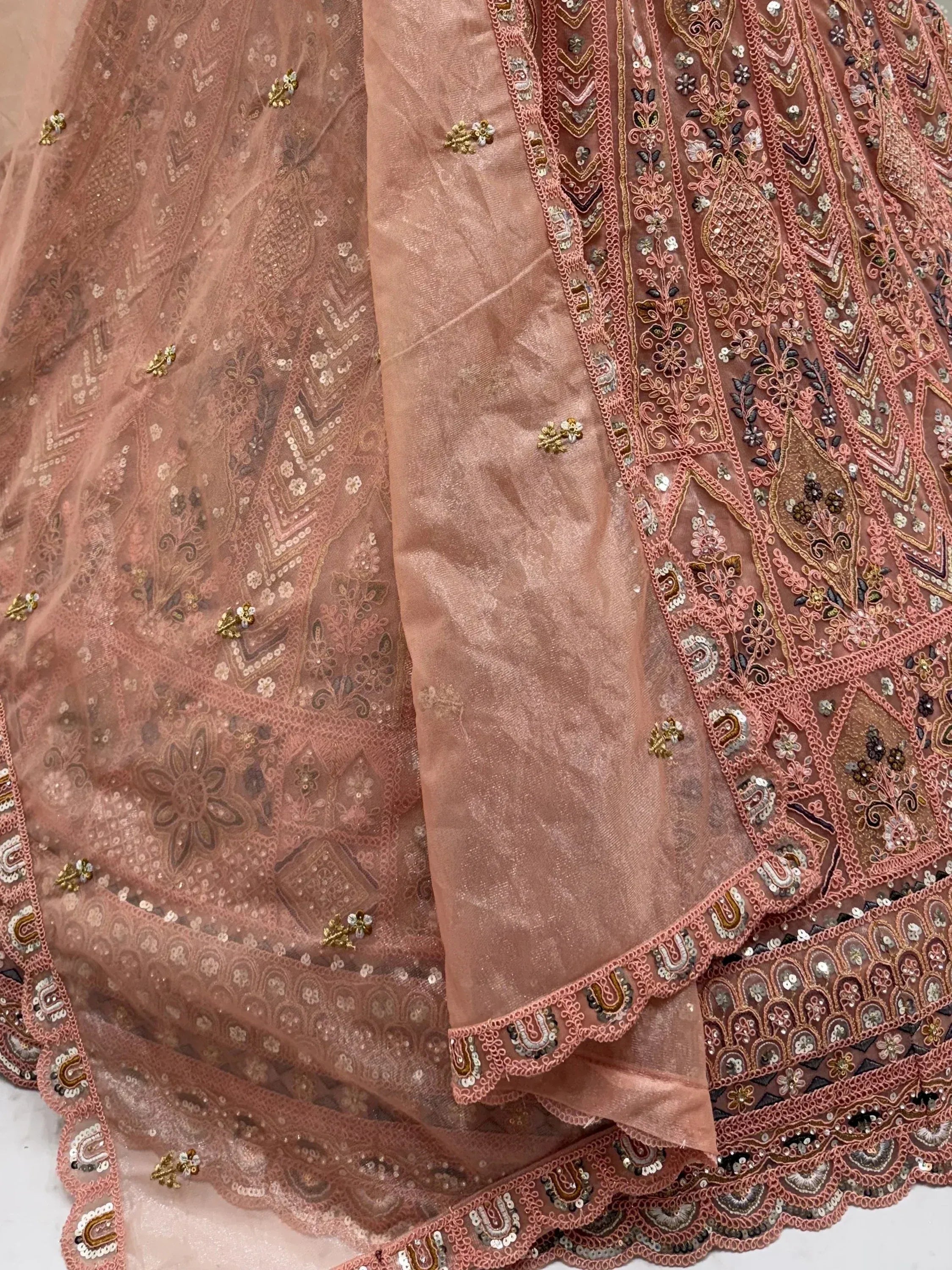 Glowing Peach Embroidered Net Wedding Wear Lehenga Choli with Dupatta