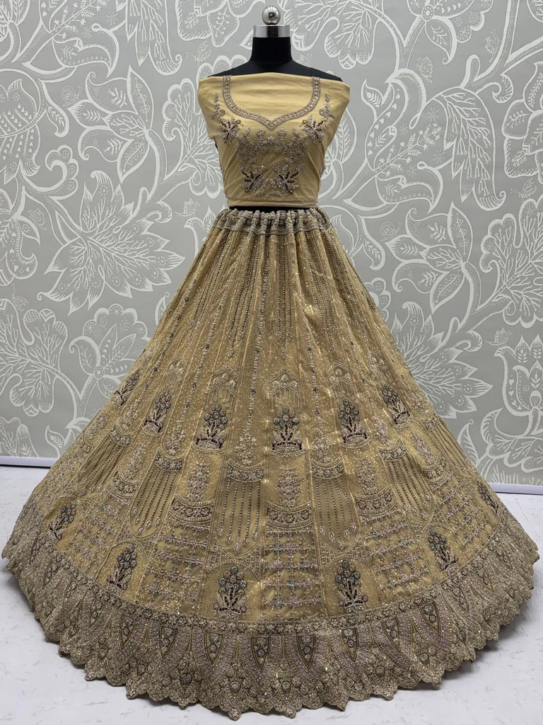 Royal Beige Zari Work Net Wedding Wear Lehenga Choli With Dupatta