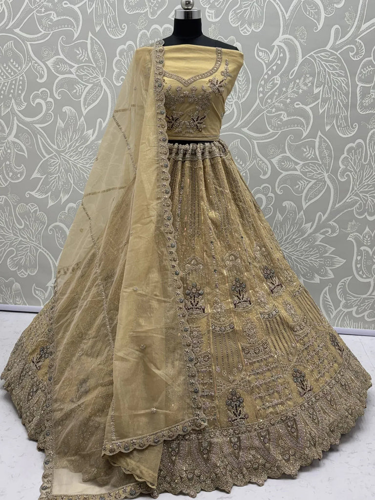 Royal Beige Zari Work Net Wedding Wear Lehenga Choli With Dupatta