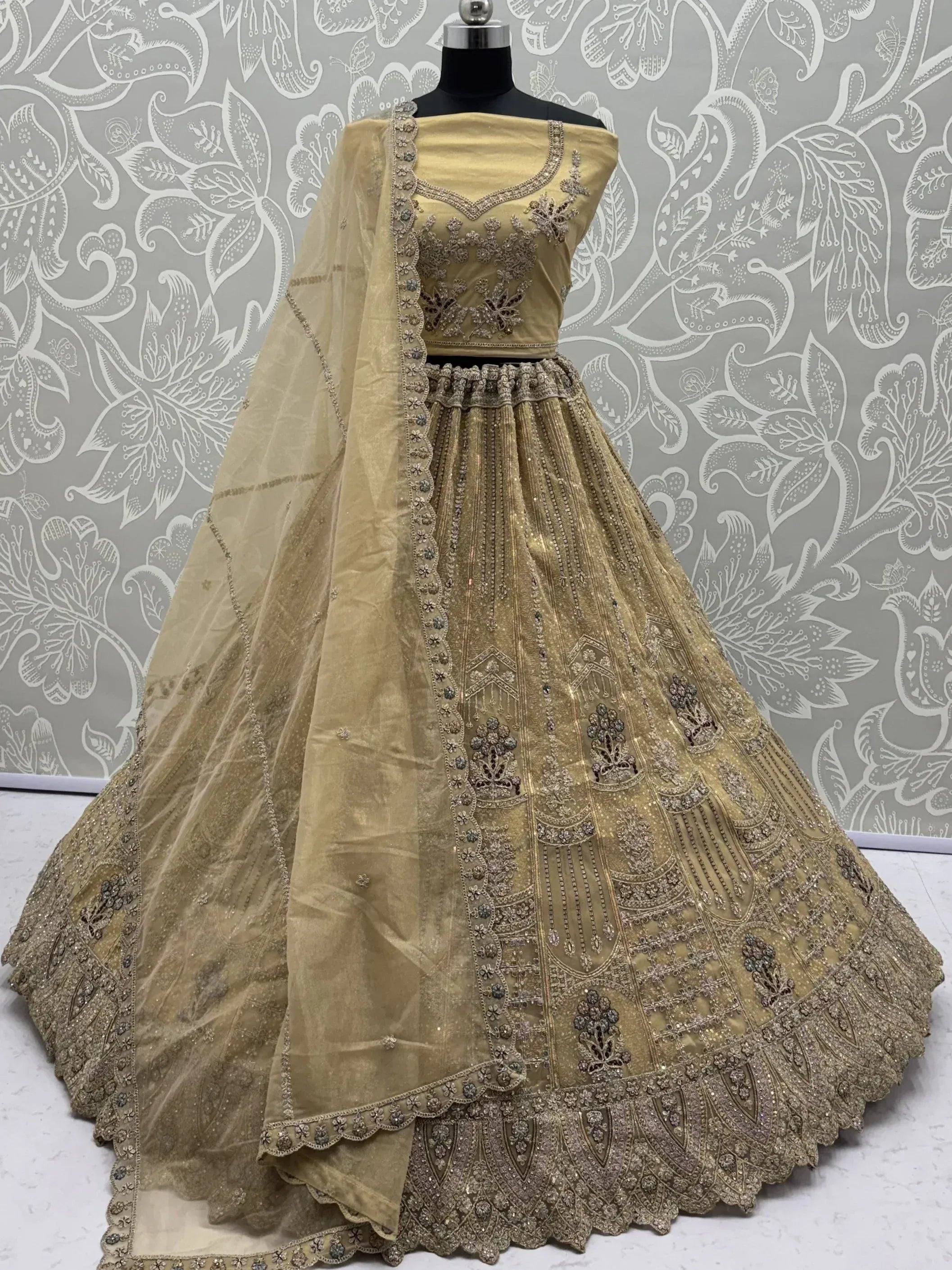 Royal Beige Zari Work Net Wedding Wear Lehenga Choli With Dupatta