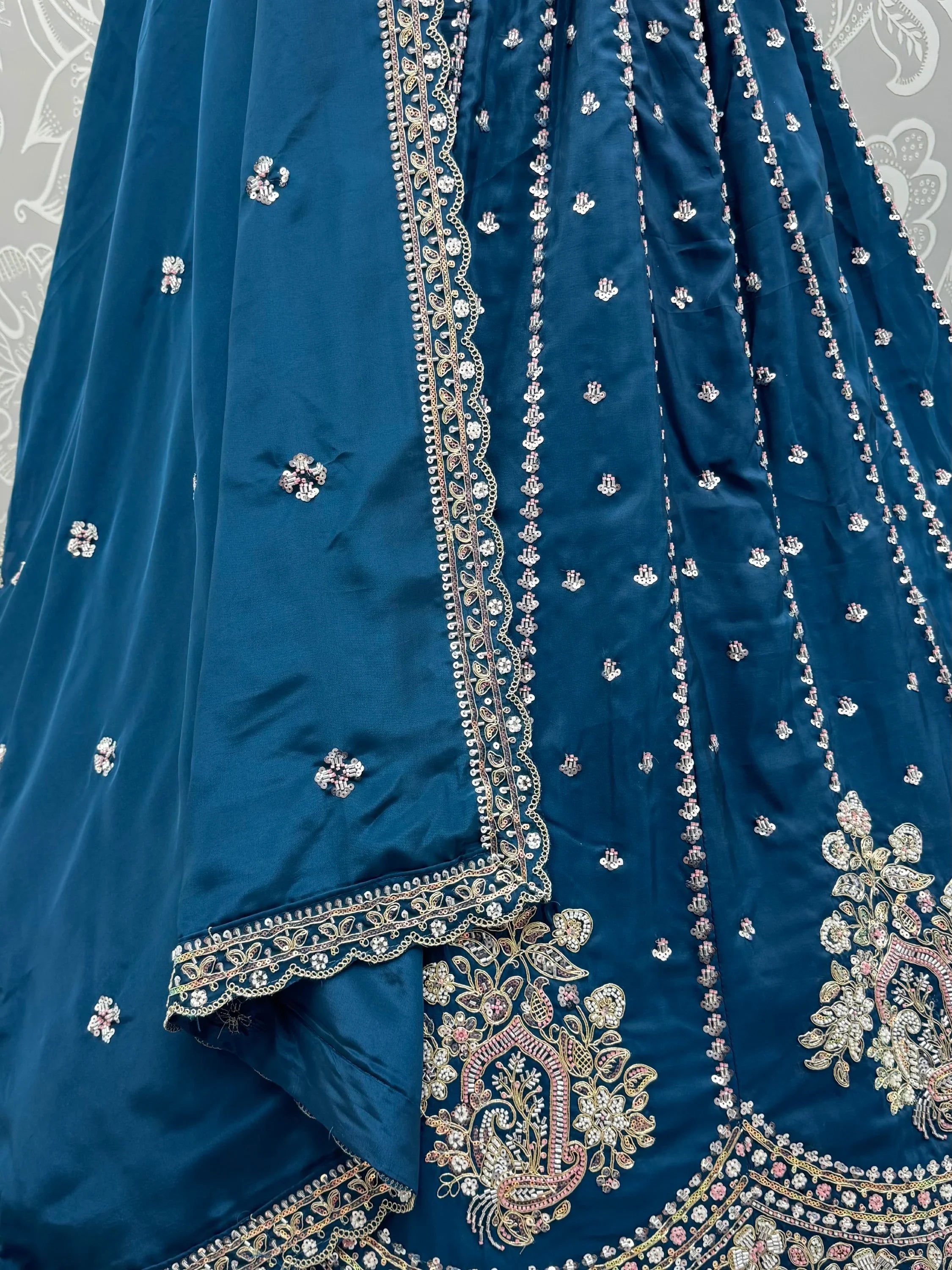 Dazzling Teal Blue Sequins Silk Wedding Wear Lehenga Choli