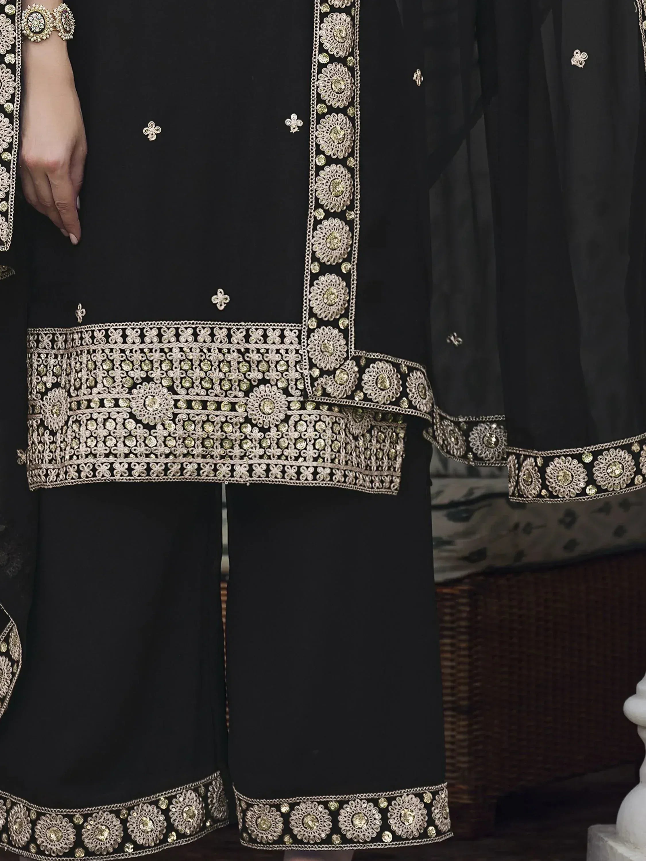 Black palazzo salwar suit with gold embroidery and floral sequin details