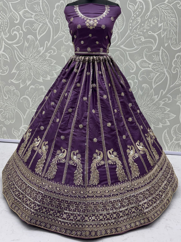 Wondrous Purple Embroidered Silk Reception Wear Lehenga Choli