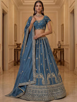 Astonishing Sky Blue Zari Embroidery Silk Sangeet Wear Lehenga Choli