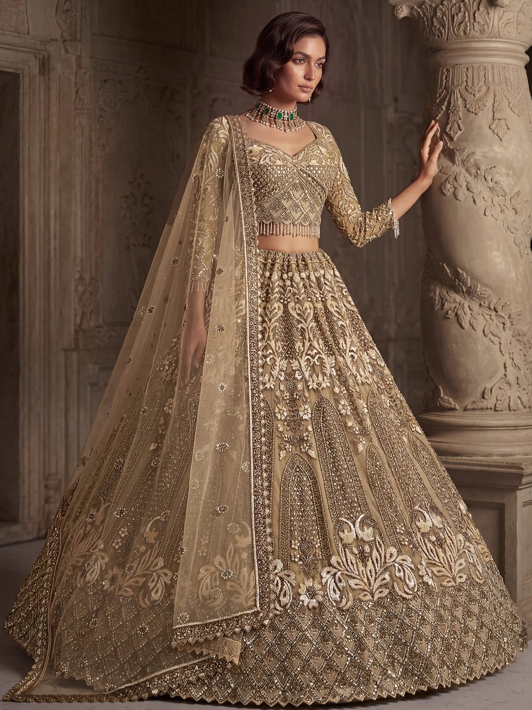 Luxurious Golden Hand Embroidery Net Bridal Lehenga Choli With Dupatta