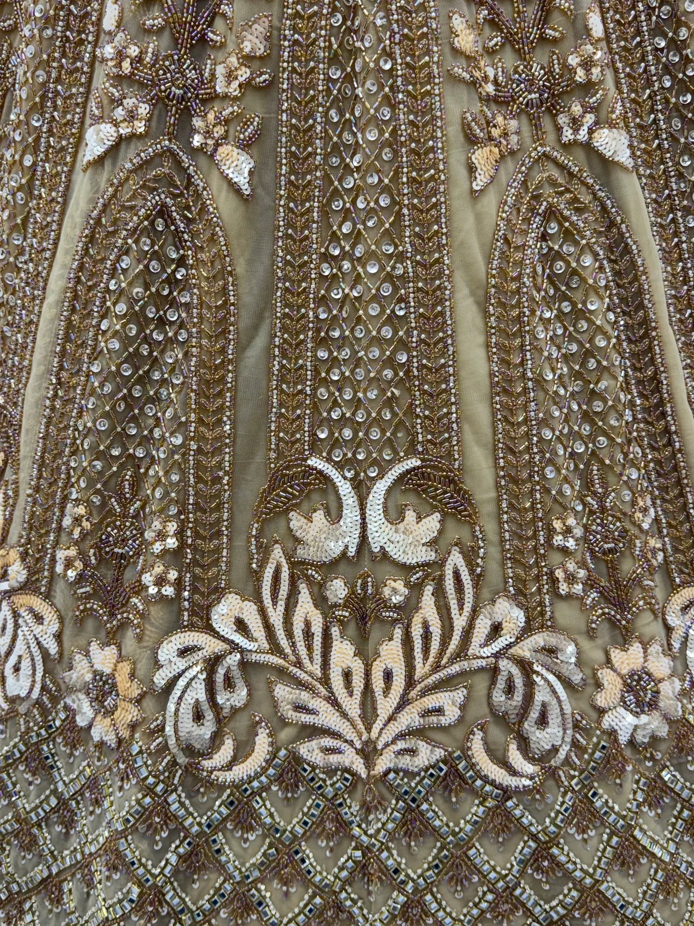 Luxurious Golden Hand Embroidery Net Bridal Lehenga Choli With Dupatta