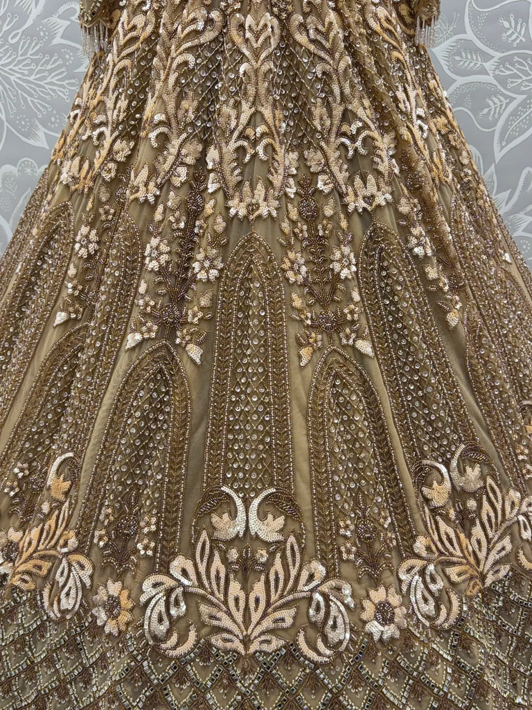 Luxurious Golden Hand Embroidery Net Bridal Lehenga Choli With Dupatta