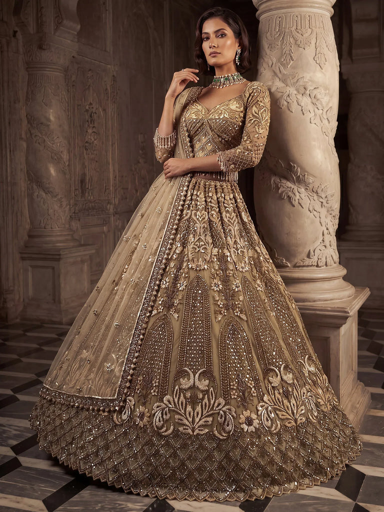 Luxurious Golden Hand Embroidery Net Bridal Lehenga Choli With Dupatta