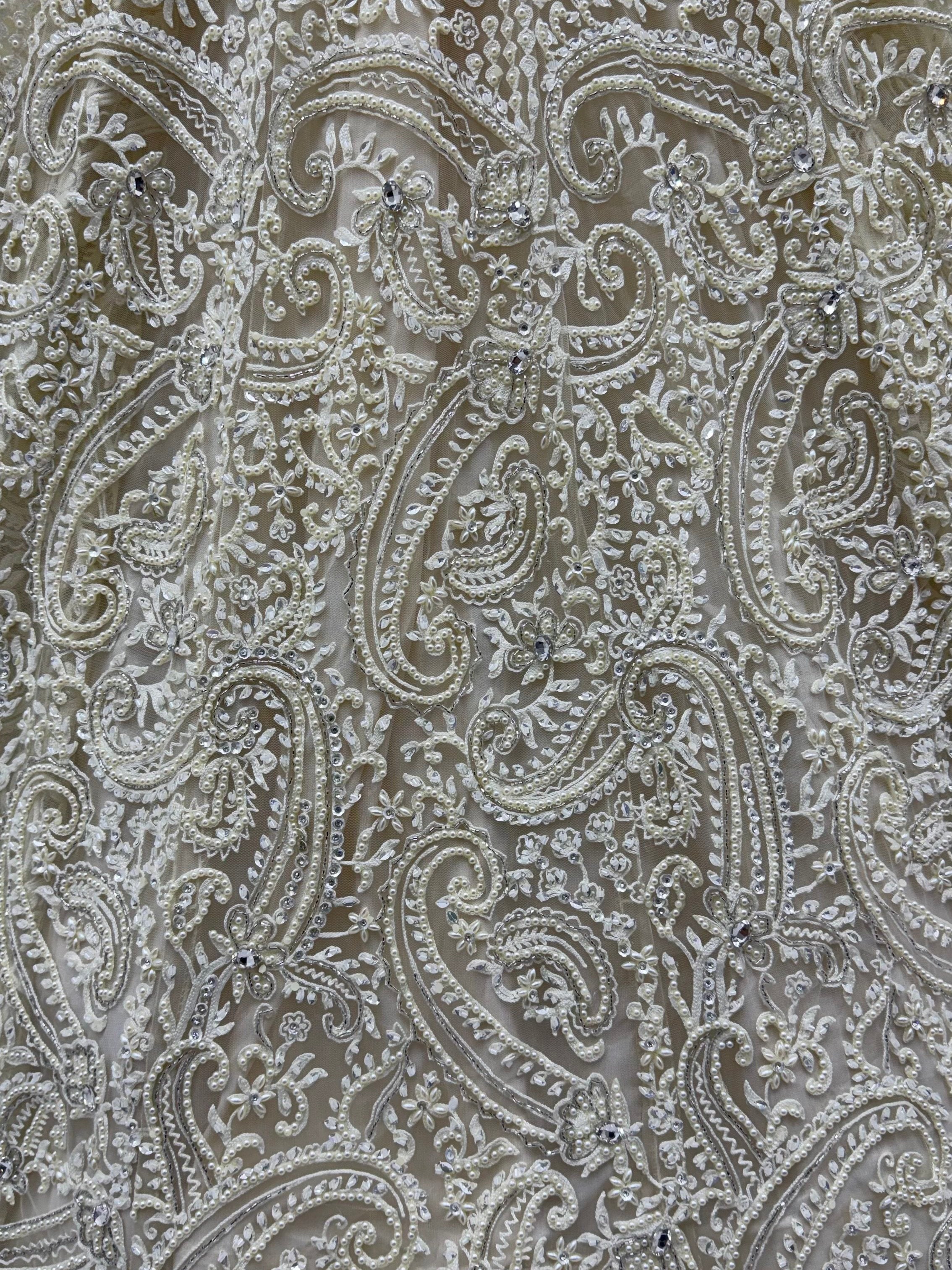 Monochrome White Hand Embroidered Net Wedding Wear Lehenga Choli