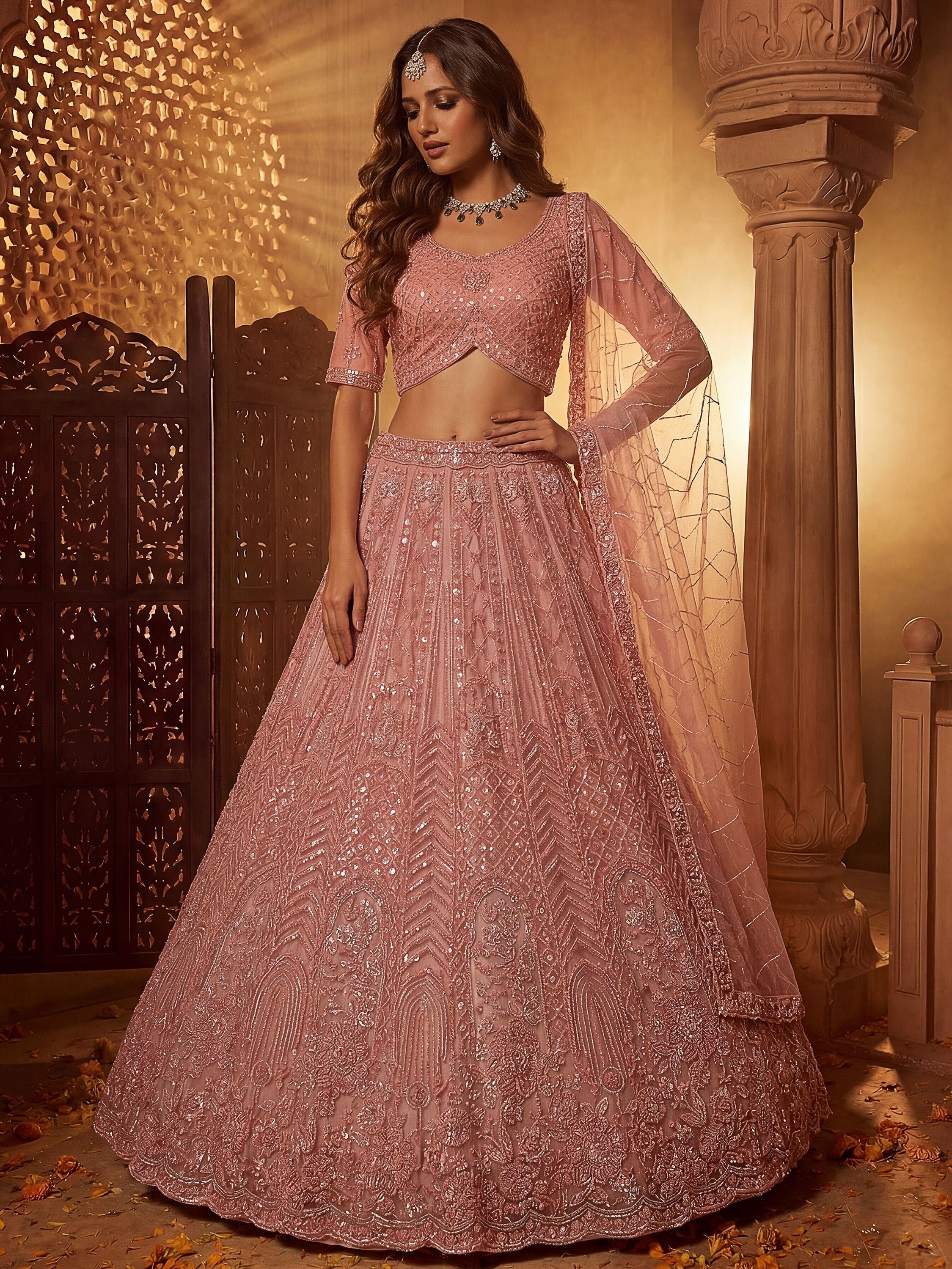 Monochrome Pink Embroidered Net Reception Wear Lehenga Choli