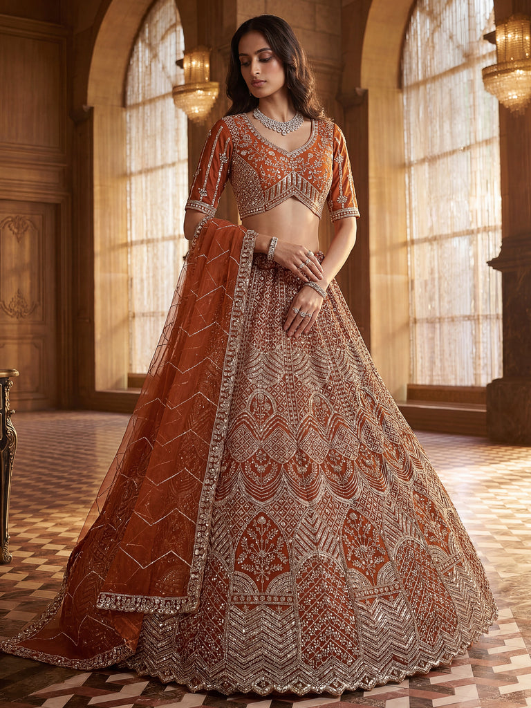 Wonderful Rust Orange Sequins Net Wedding Wear Lehenga Choli
