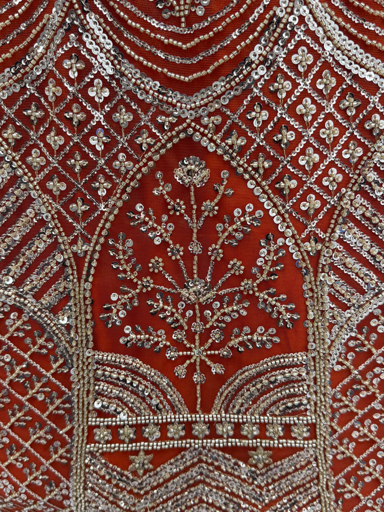 Wonderful Rust Orange Sequins Net Wedding Wear Lehenga Choli