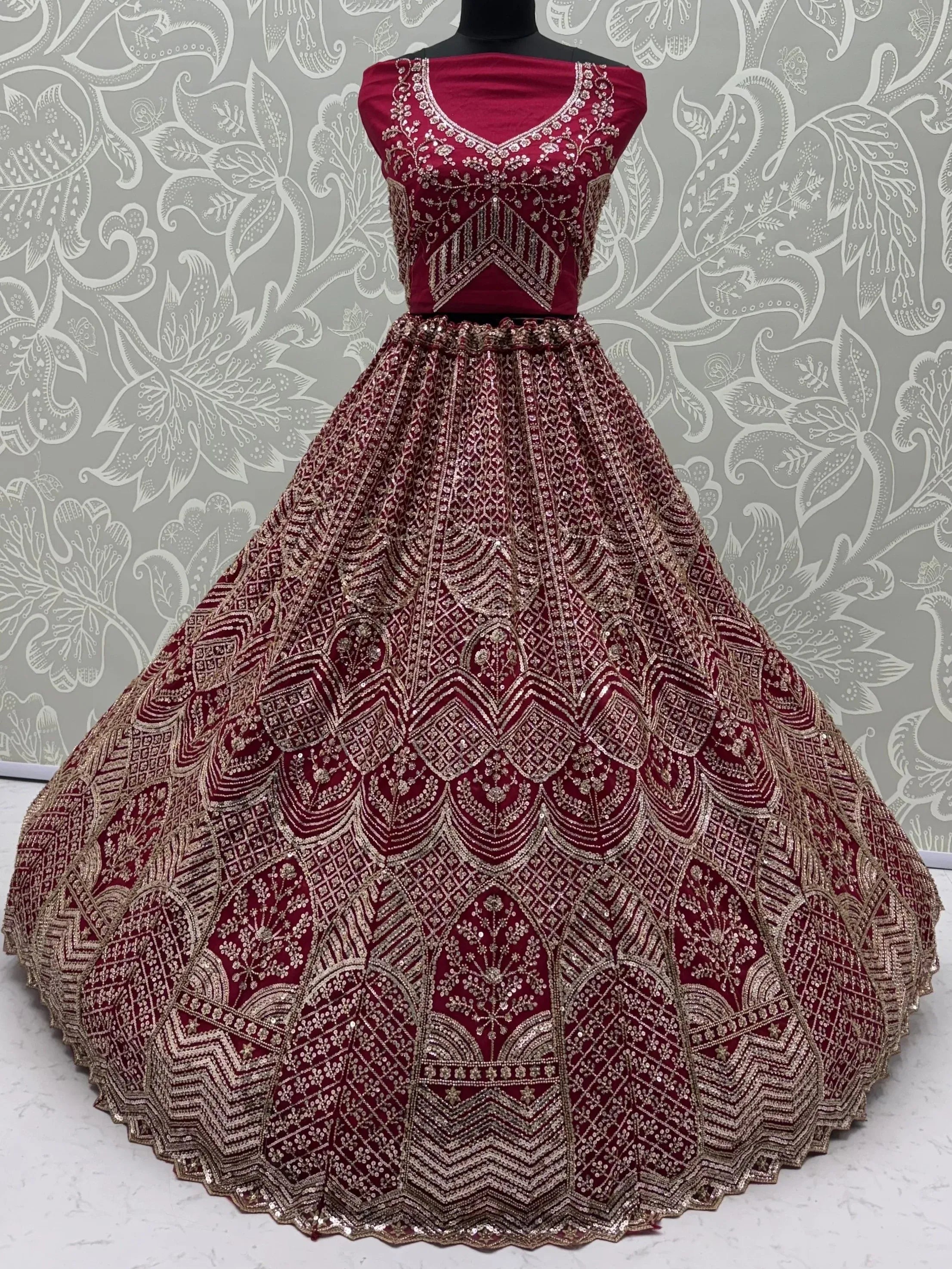 Impressive Pink Embroidered Net Bridal Lehenga Choli With Dupatta