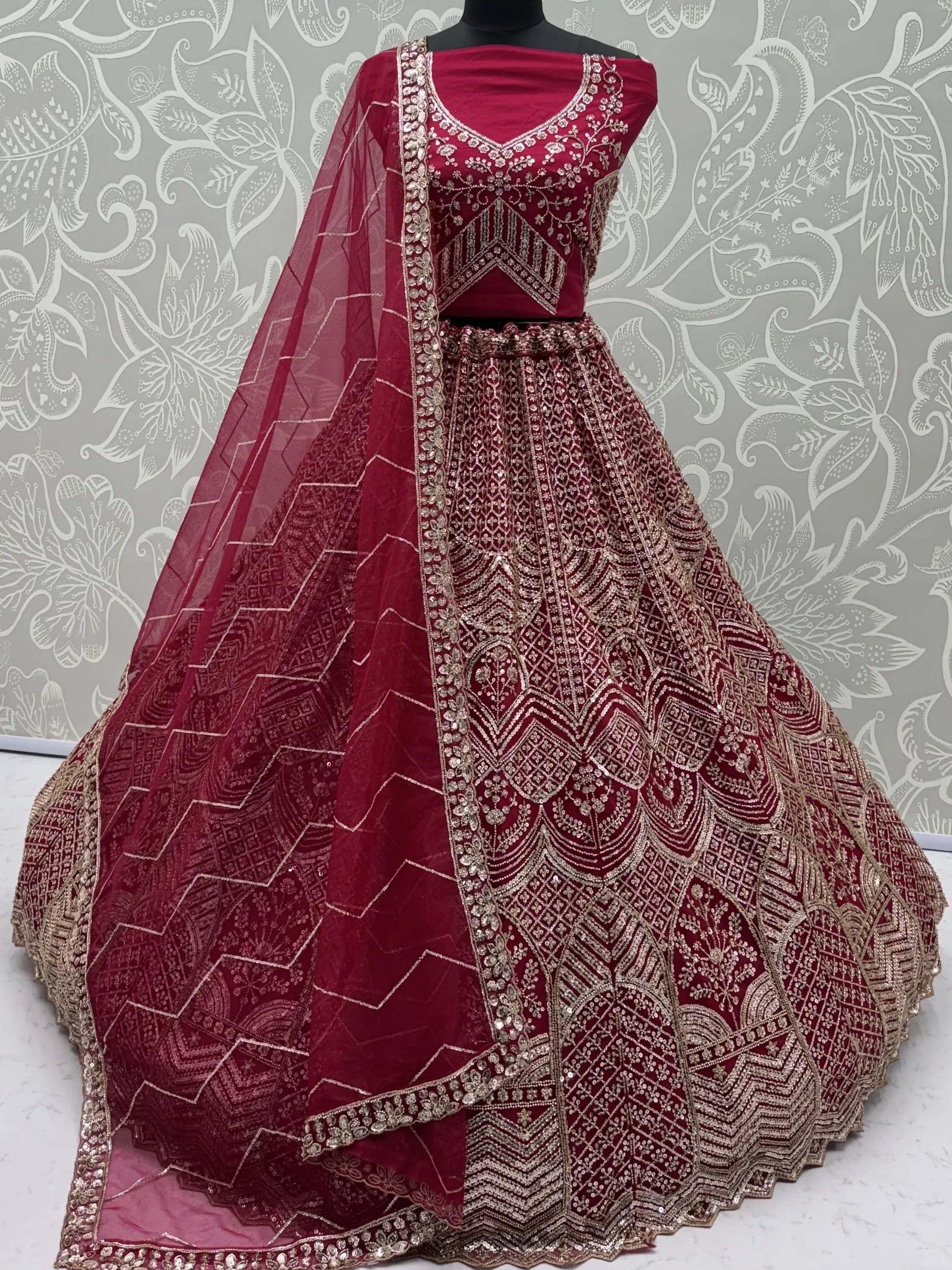 Impressive Pink Embroidered Net Bridal Lehenga Choli With Dupatta