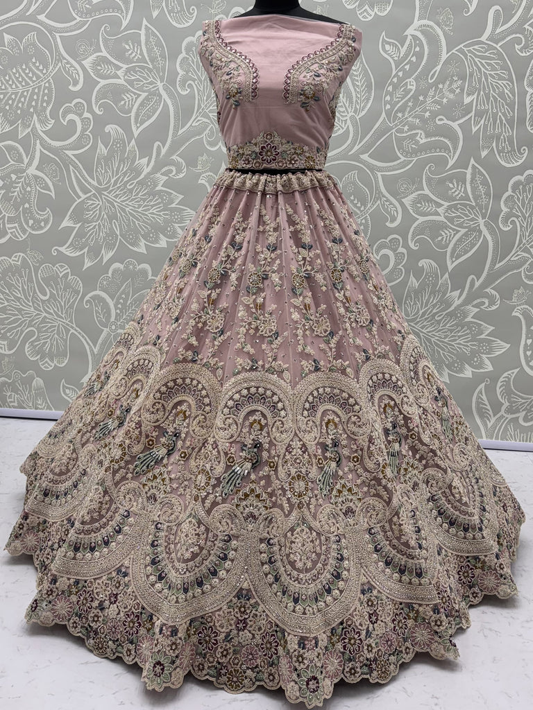 Lavish Dusty Pink Thread Embroidered Net Engagement Wear Lehenga Choli