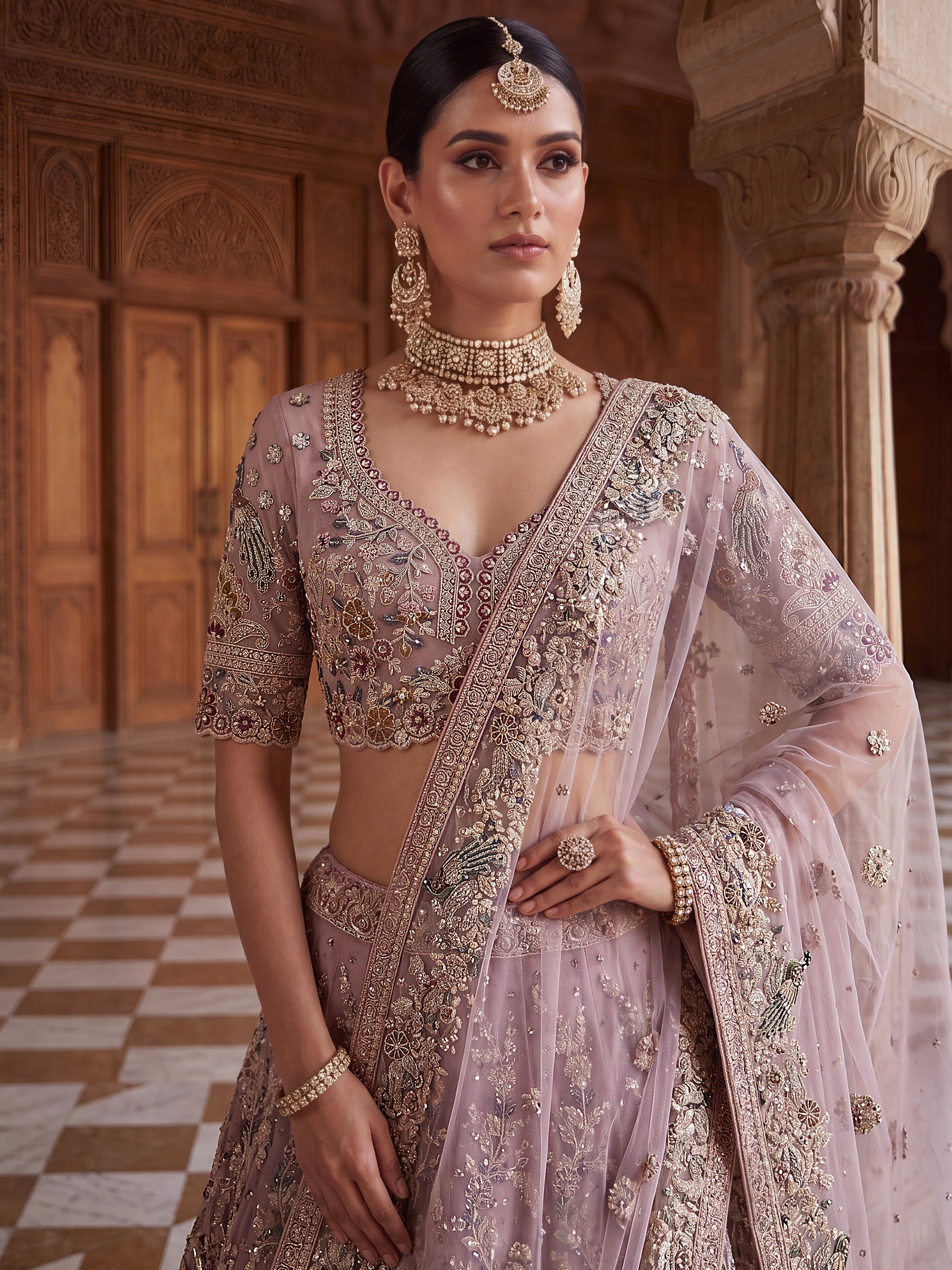 Lavish Dusty Pink Thread Embroidered Net Engagement Wear Lehenga Choli