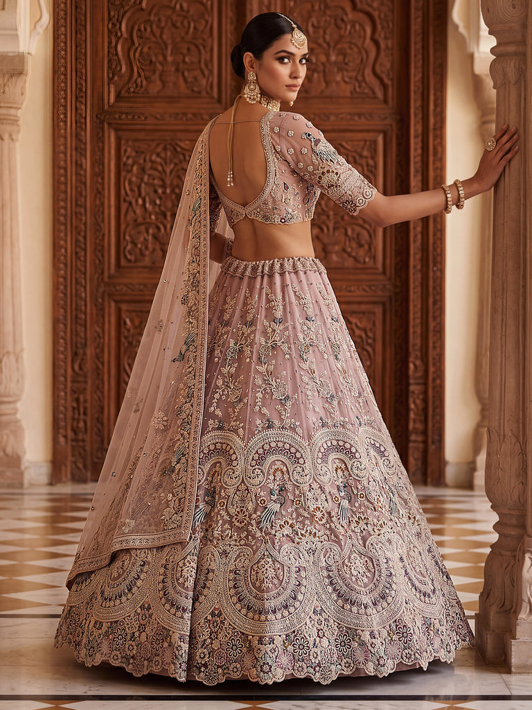 Lavish Dusty Pink Thread Embroidered Net Engagement Wear Lehenga Choli