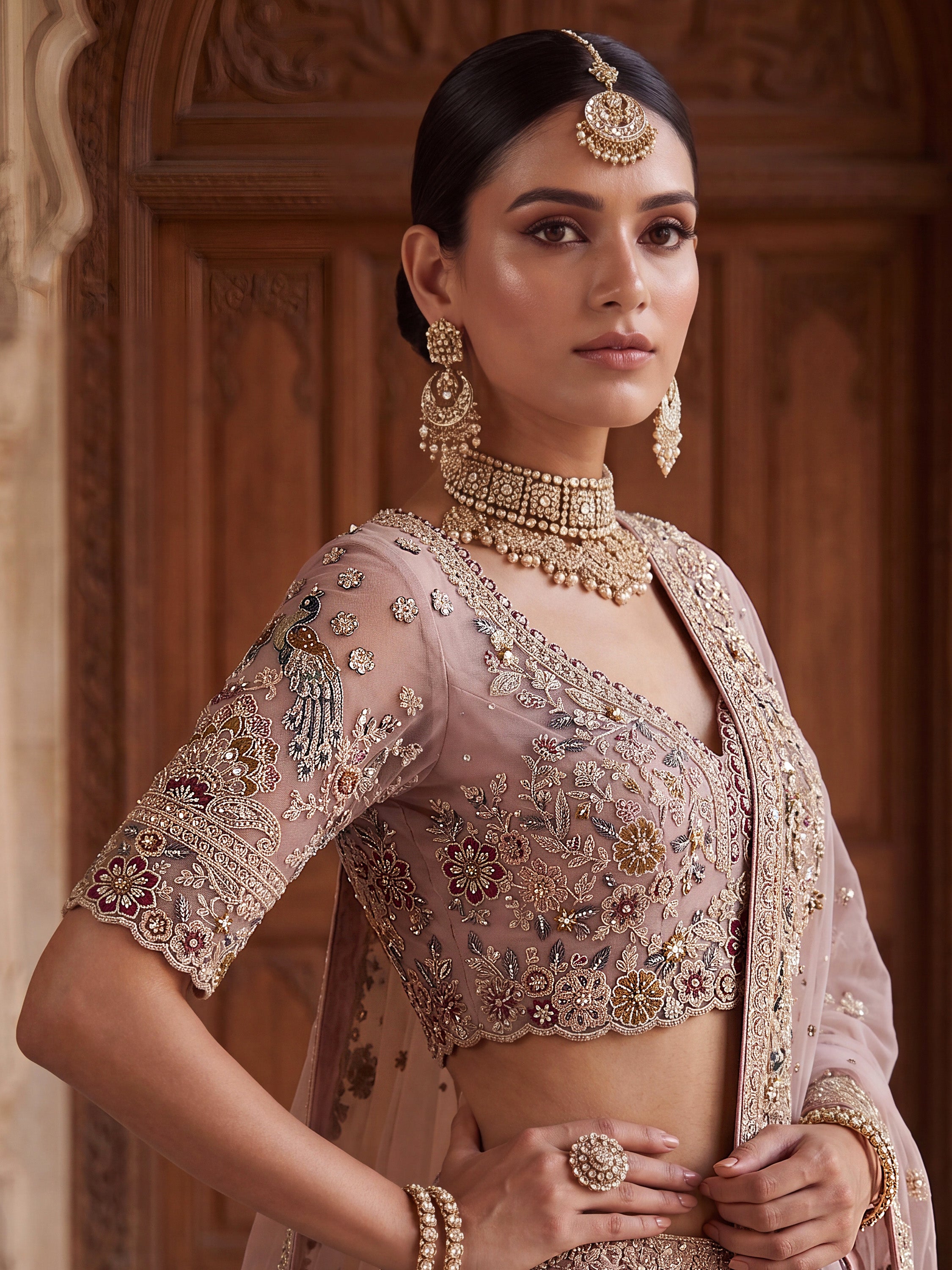 Lavish Dusty Pink Thread Embroidered Net Engagement Wear Lehenga Choli