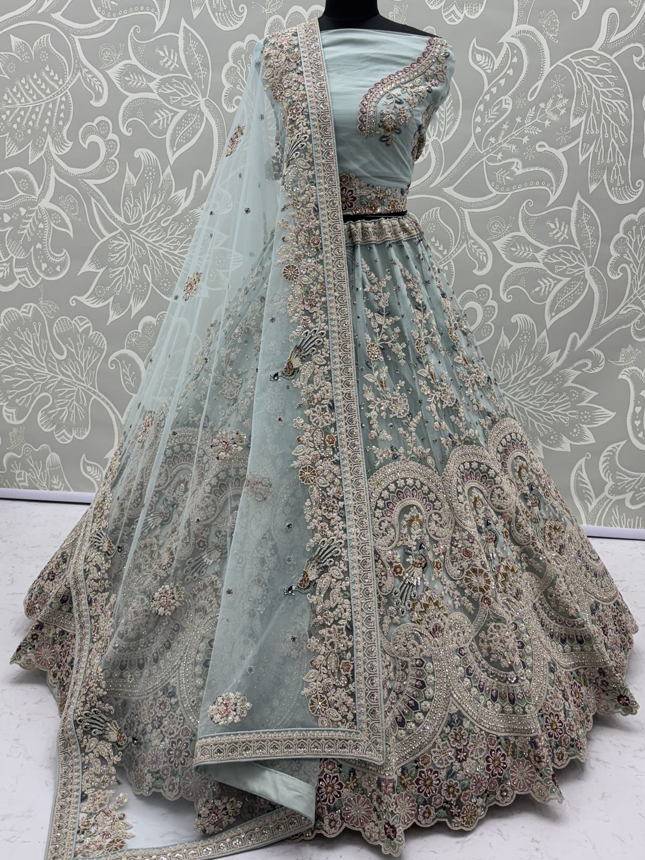 Tremendous Sky Blue Zari Work Net Wedding Wear Lehenga With Blouse