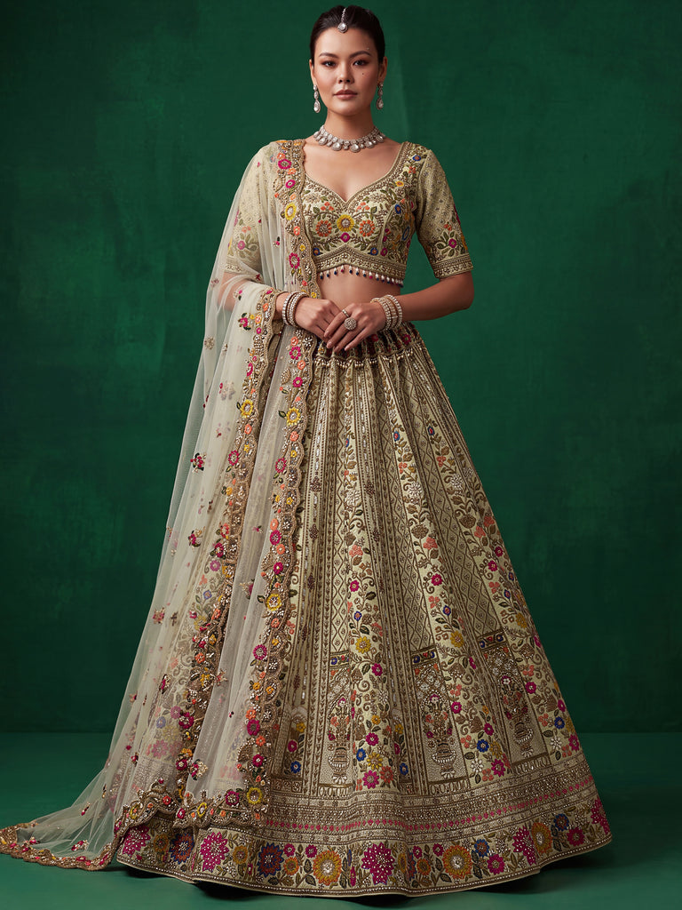 Luxurious Pista Green Hand Embroidered Silk Reception Wear Lehenga Choli