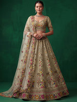 Luxurious Pista Green Hand Embroidered Silk Reception Wear Lehenga Choli