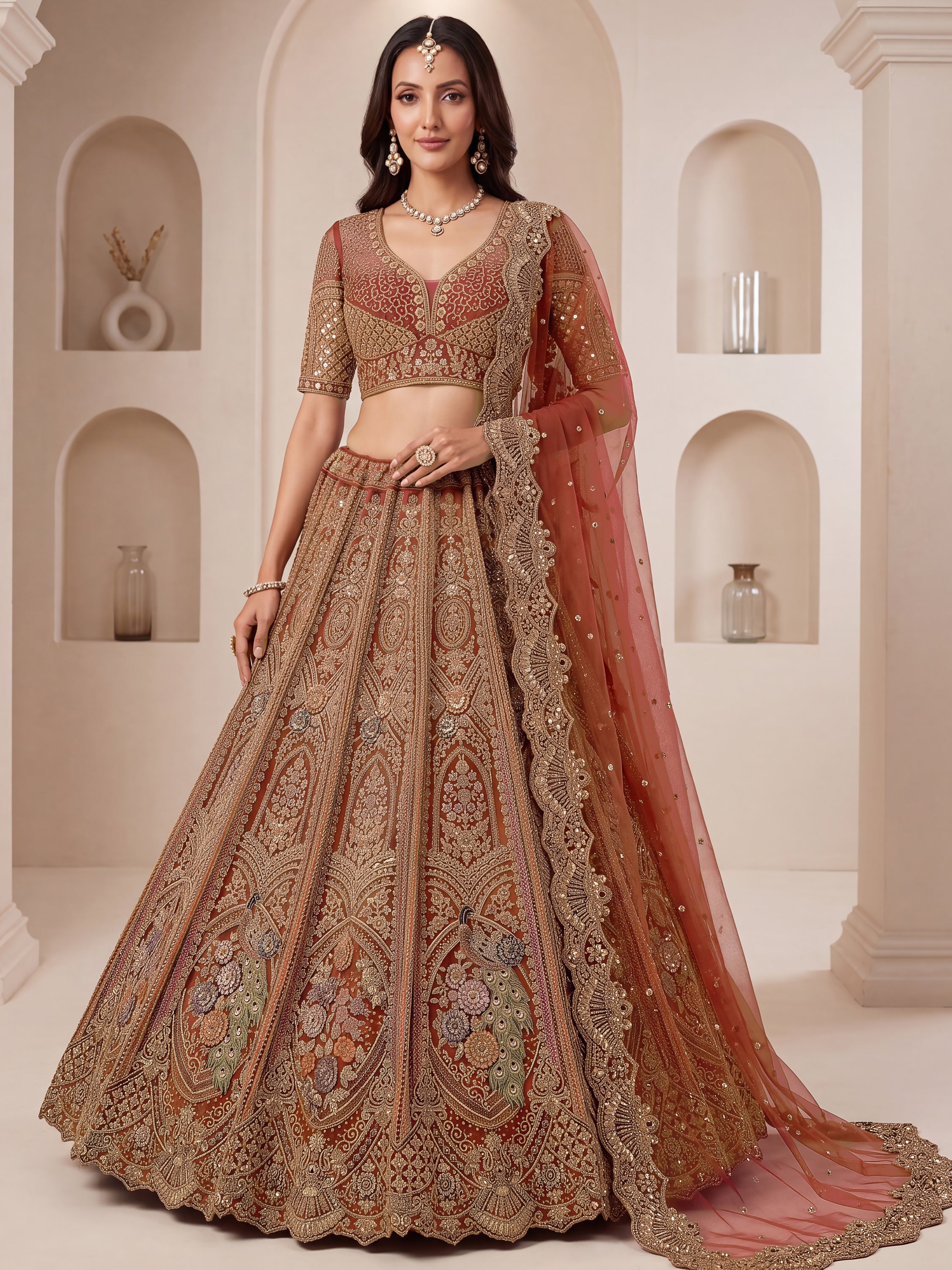 Regal Rust Pink Zircon Work Net Wedding Wear Lehenga With Blouse