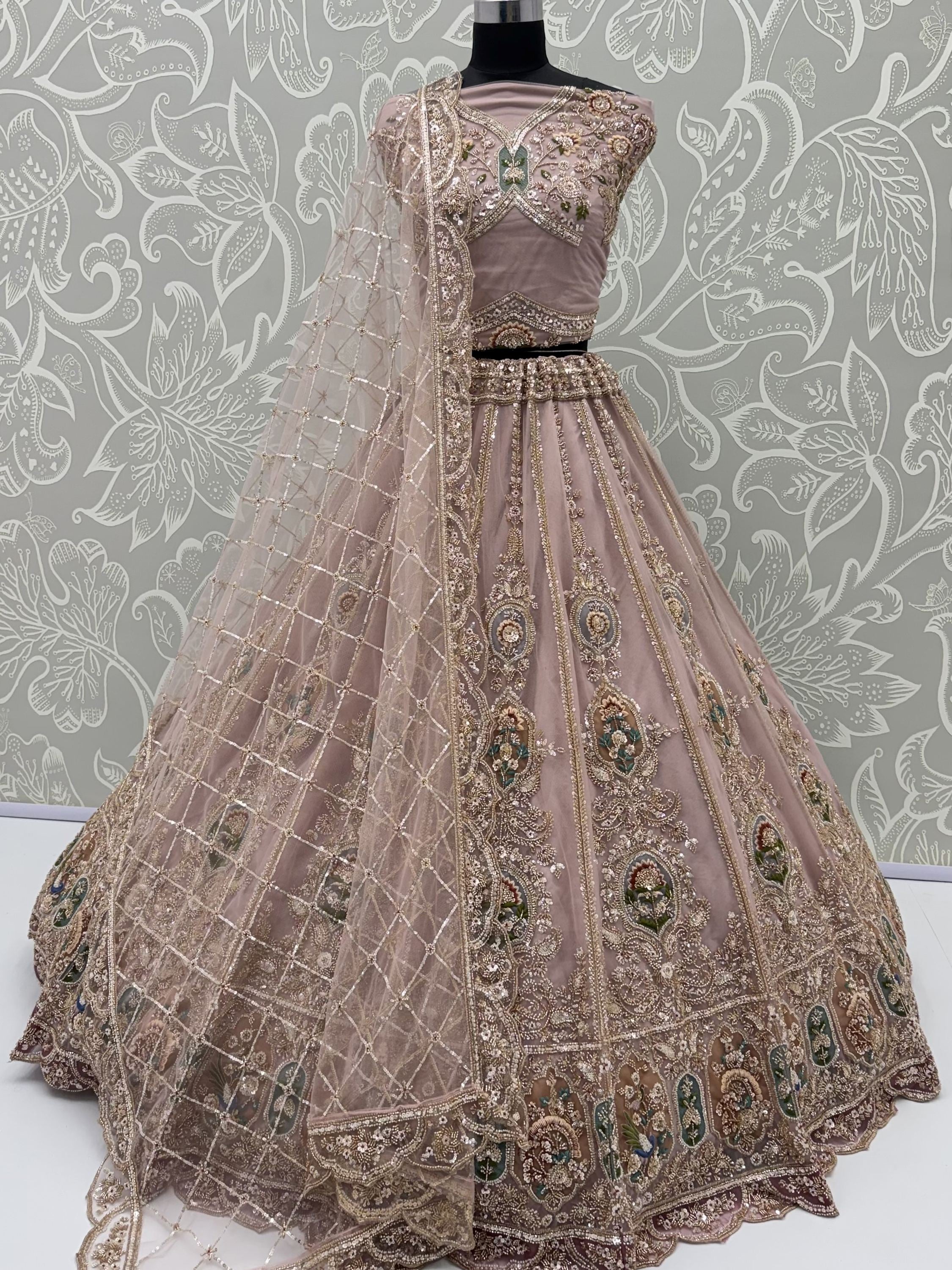 Lovable Pink Hand Work Net Engagement Wear Lehenga Choli With Dupatta