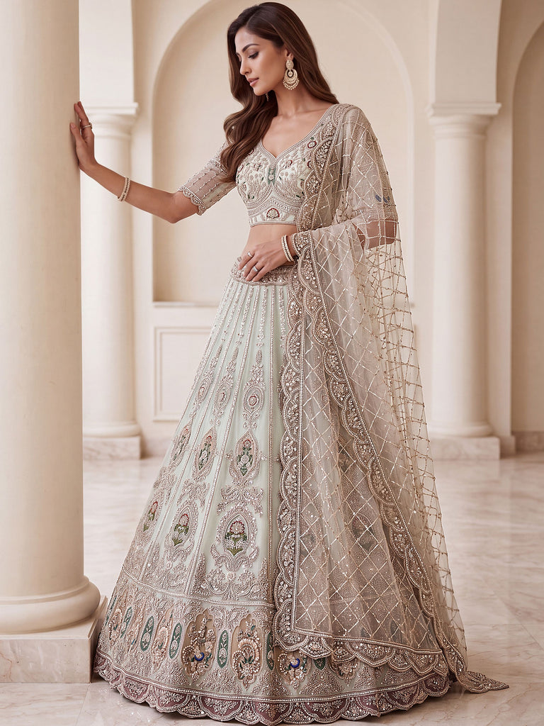 Rich Mint Green Heavy Embroidered Net Reception Wear Lehenga Choli