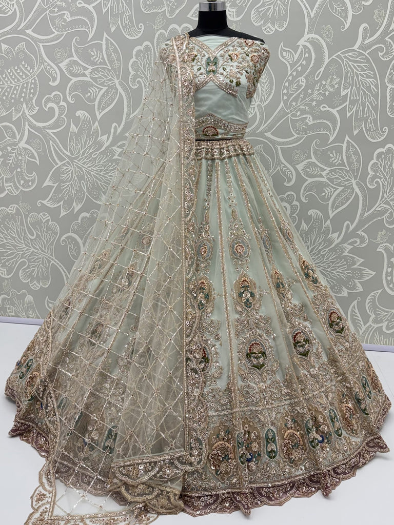 Rich Mint Green Heavy Embroidered Net Reception Wear Lehenga Choli