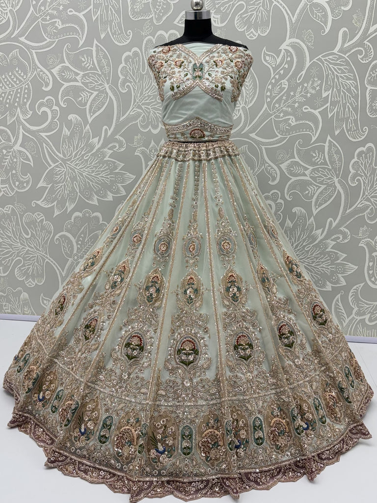 Rich Mint Green Heavy Embroidered Net Reception Wear Lehenga Choli