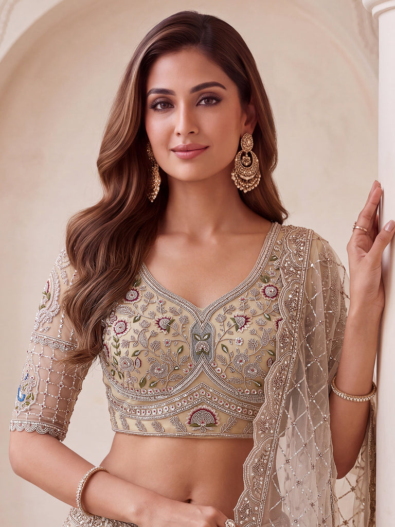 Noteworthy Beige Zari Work Net Sangeet Wear Lehenga Choli With Dupatta