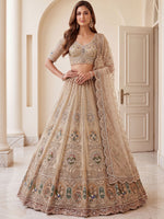 Noteworthy Beige Zari Work Net Sangeet Wear Lehenga Choli With Dupatta