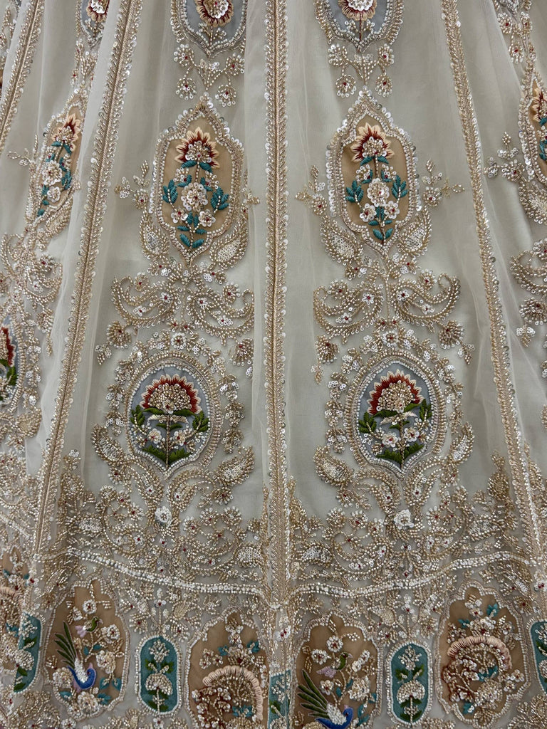 Noteworthy Beige Zari Work Net Sangeet Wear Lehenga Choli With Dupatta
