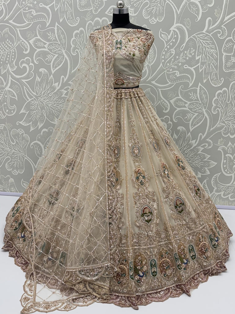 Noteworthy Beige Zari Work Net Sangeet Wear Lehenga Choli With Dupatta