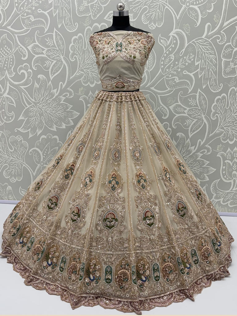 Noteworthy Beige Zari Work Net Sangeet Wear Lehenga Choli With Dupatta
