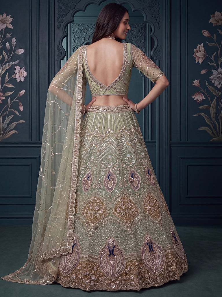 Luxurious Pista Green Hand Work Net Reception Wear Lehenga Choli With Dupatta
