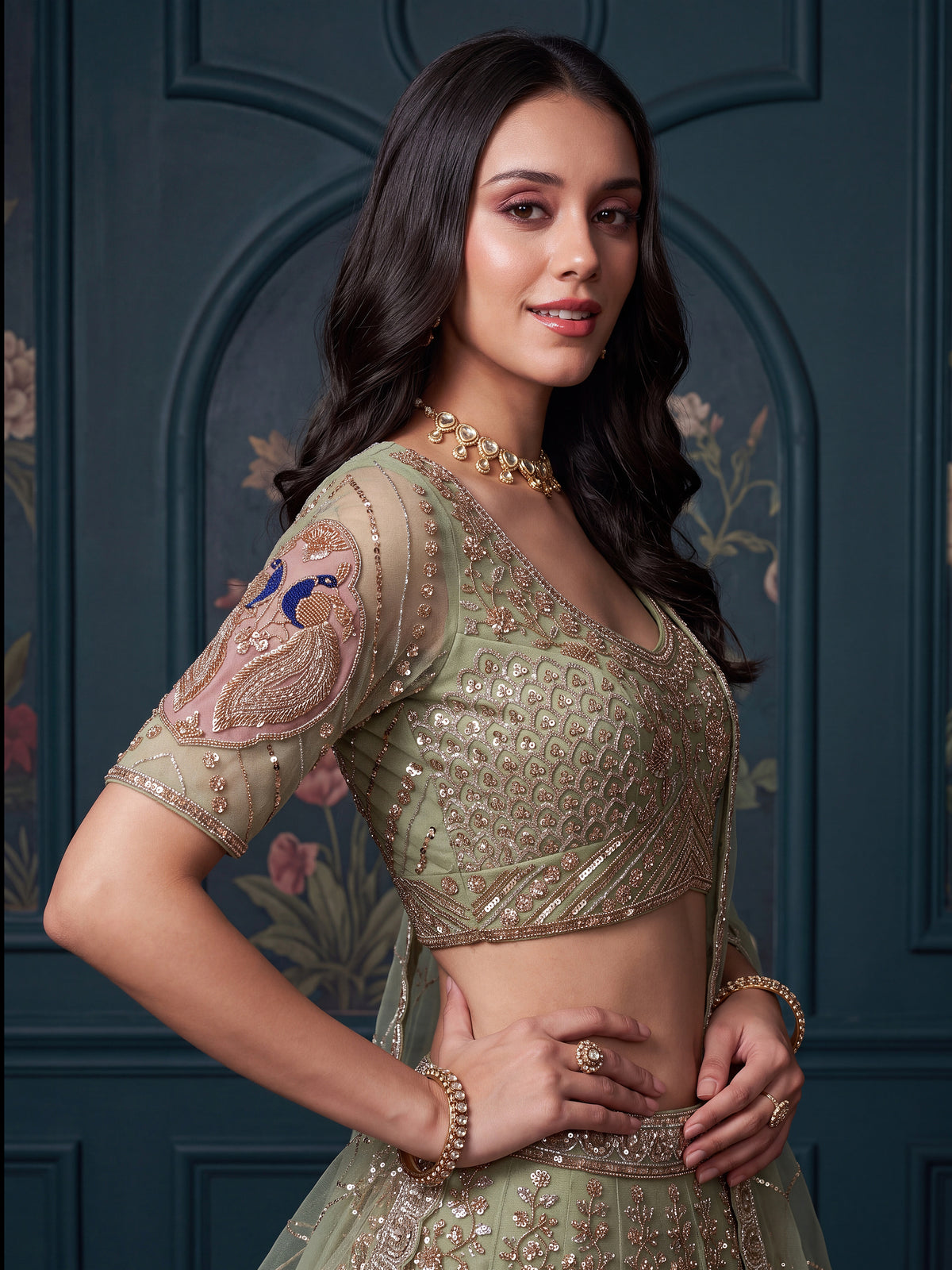 Luxurious Pista Green Hand Work Net Reception Wear Lehenga Choli With Dupatta