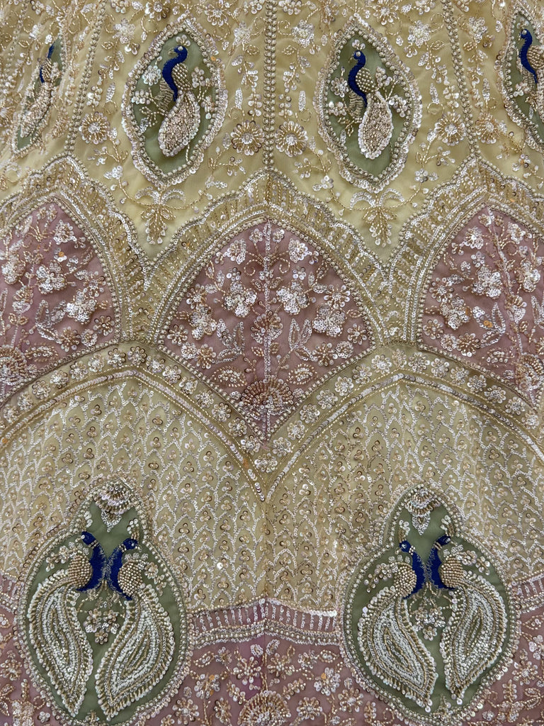 Gorgeous Golden Bead Embroidered Net Sangeet Wear Lehenga Choli