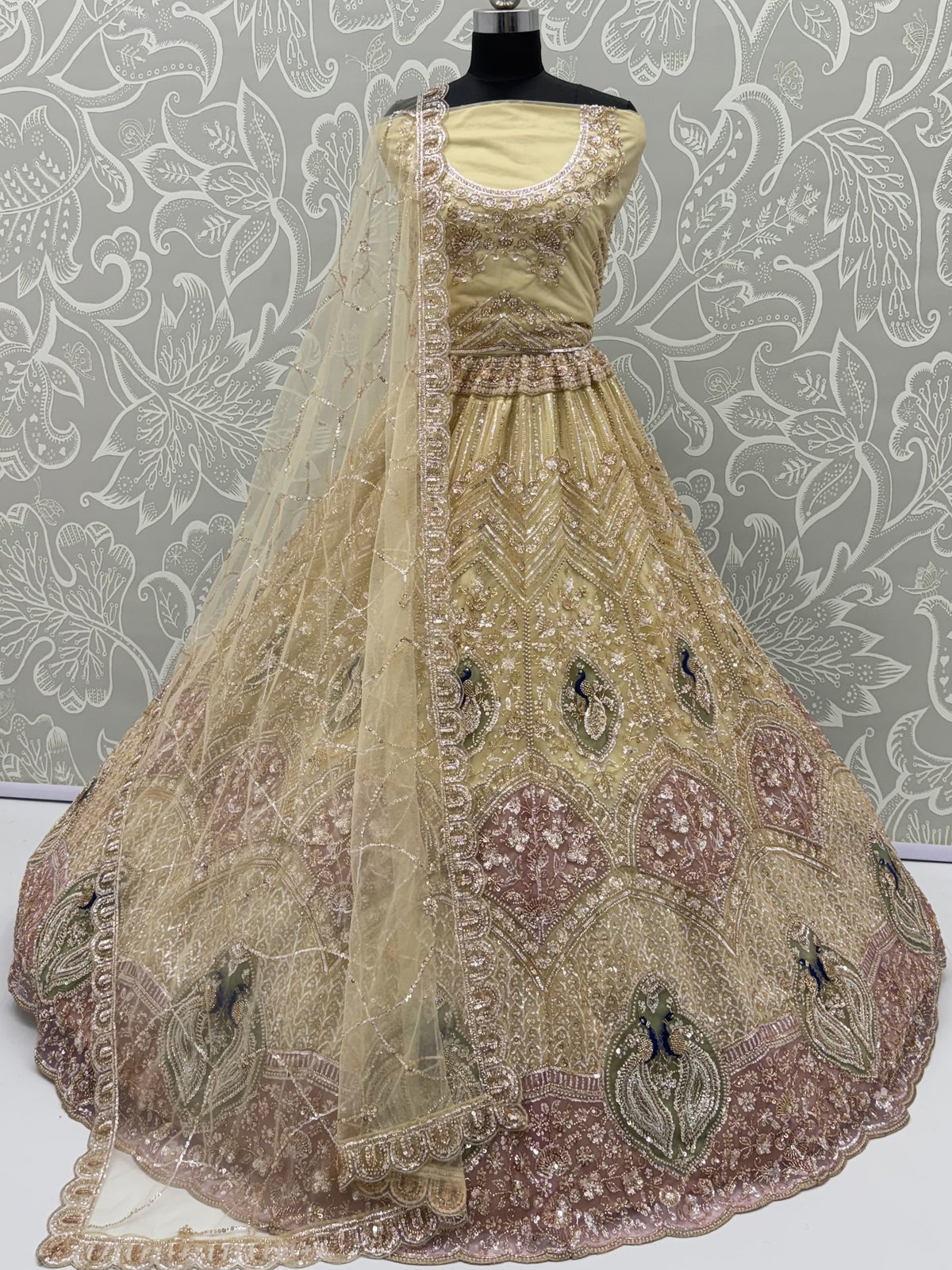 Gorgeous Golden Bead Embroidered Net Sangeet Wear Lehenga Choli