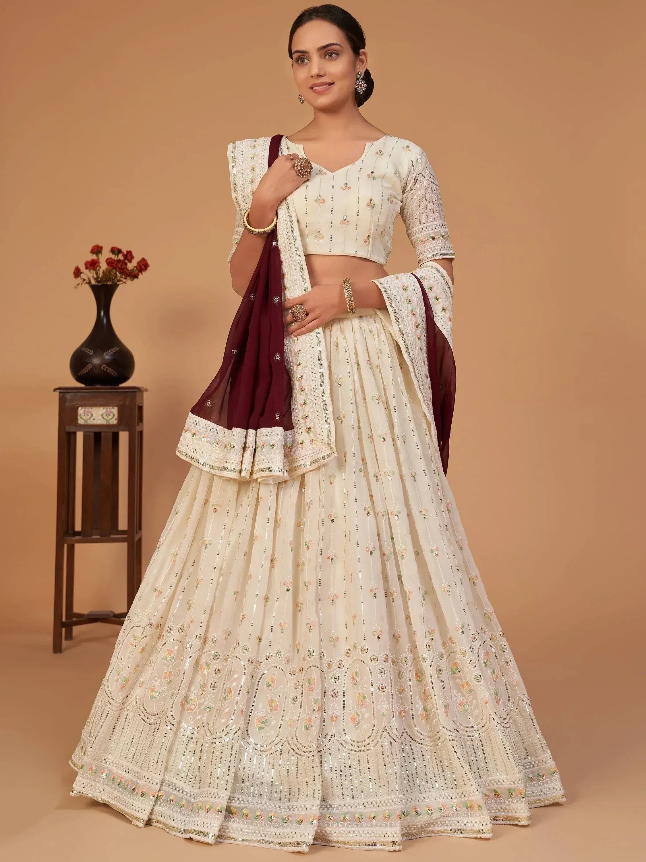 Cream embroidered lehenga choli with maroon dupatta, Indian ethnic wear for weddings and festivals