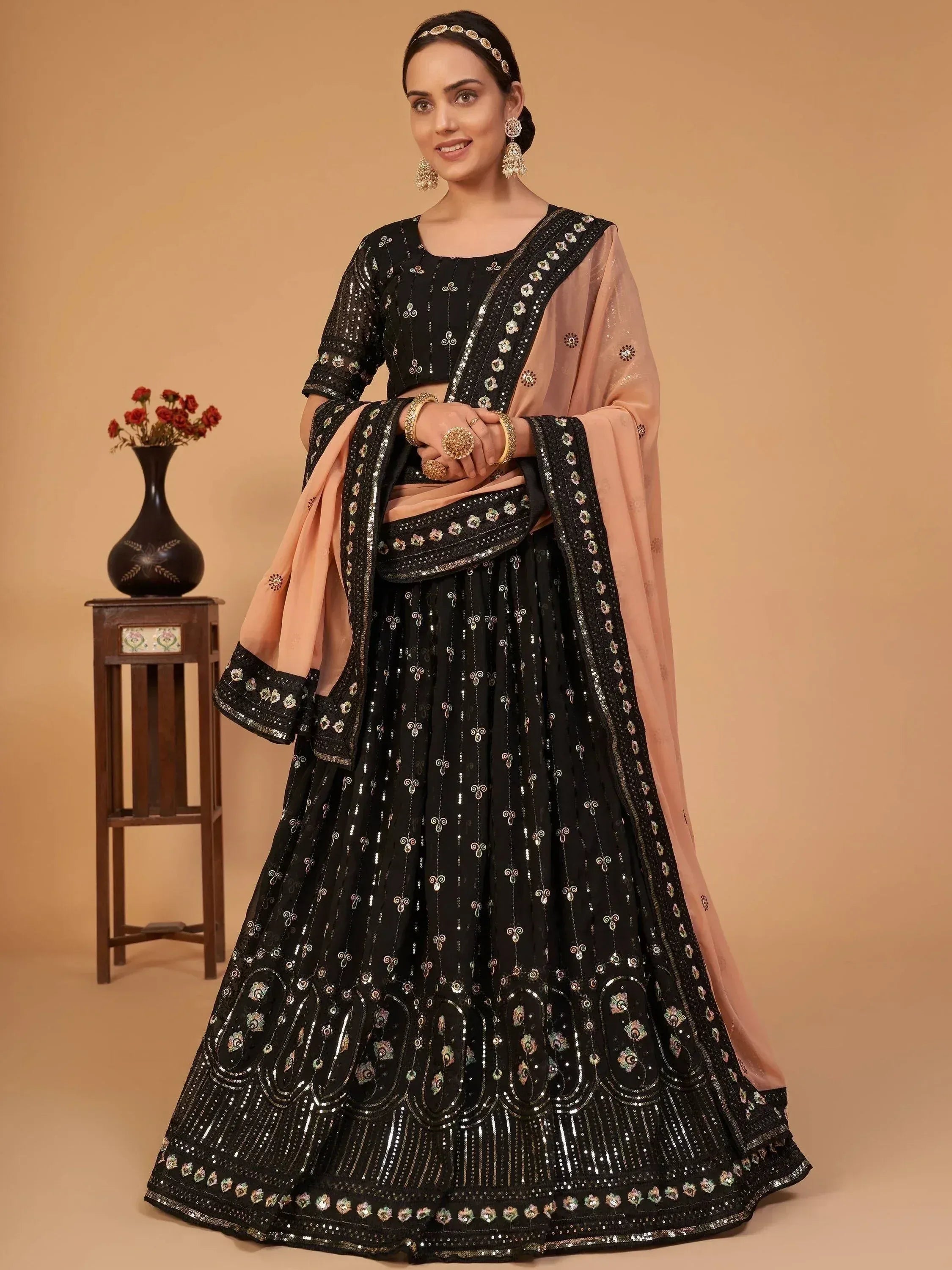 Black embroidered lehenga choli with peach dupatta, Indian ethnic wear for weddings and parties