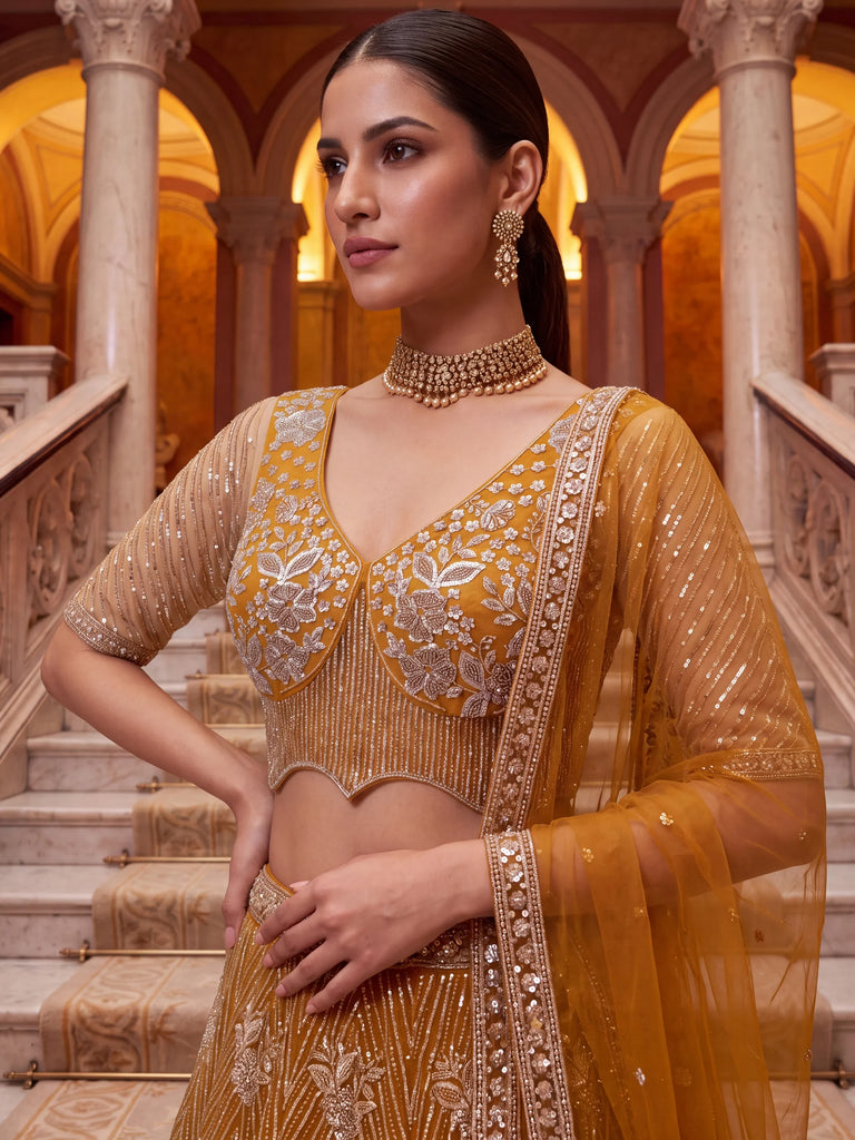Glowing Mustard Yellow Bead Work Net Reception Wear Lehenga Choli