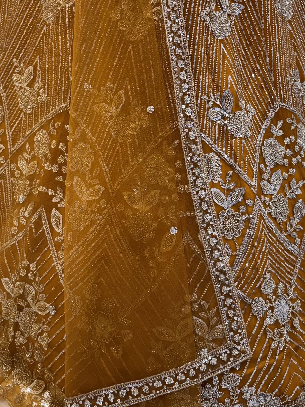 Glowing Mustard Yellow Bead Work Net Reception Wear Lehenga Choli