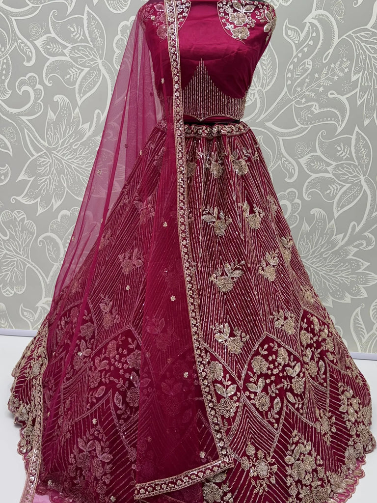 Captivating Rani Pink Thread Work Net Engagement Wear Lehenga Choli