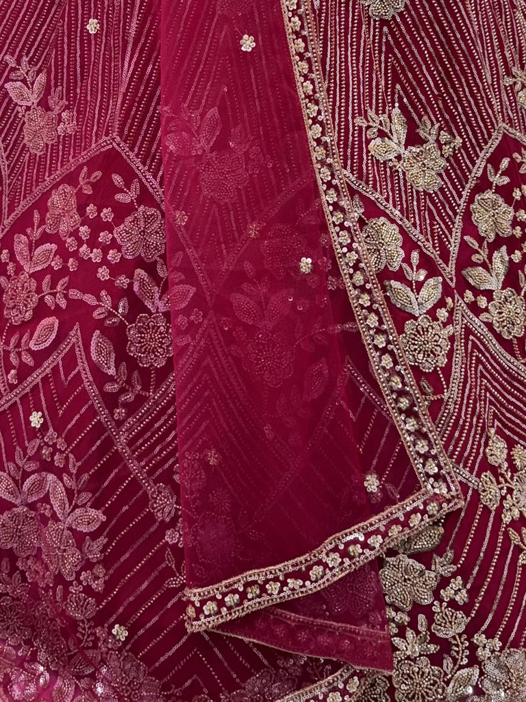Captivating Rani Pink Thread Work Net Engagement Wear Lehenga Choli