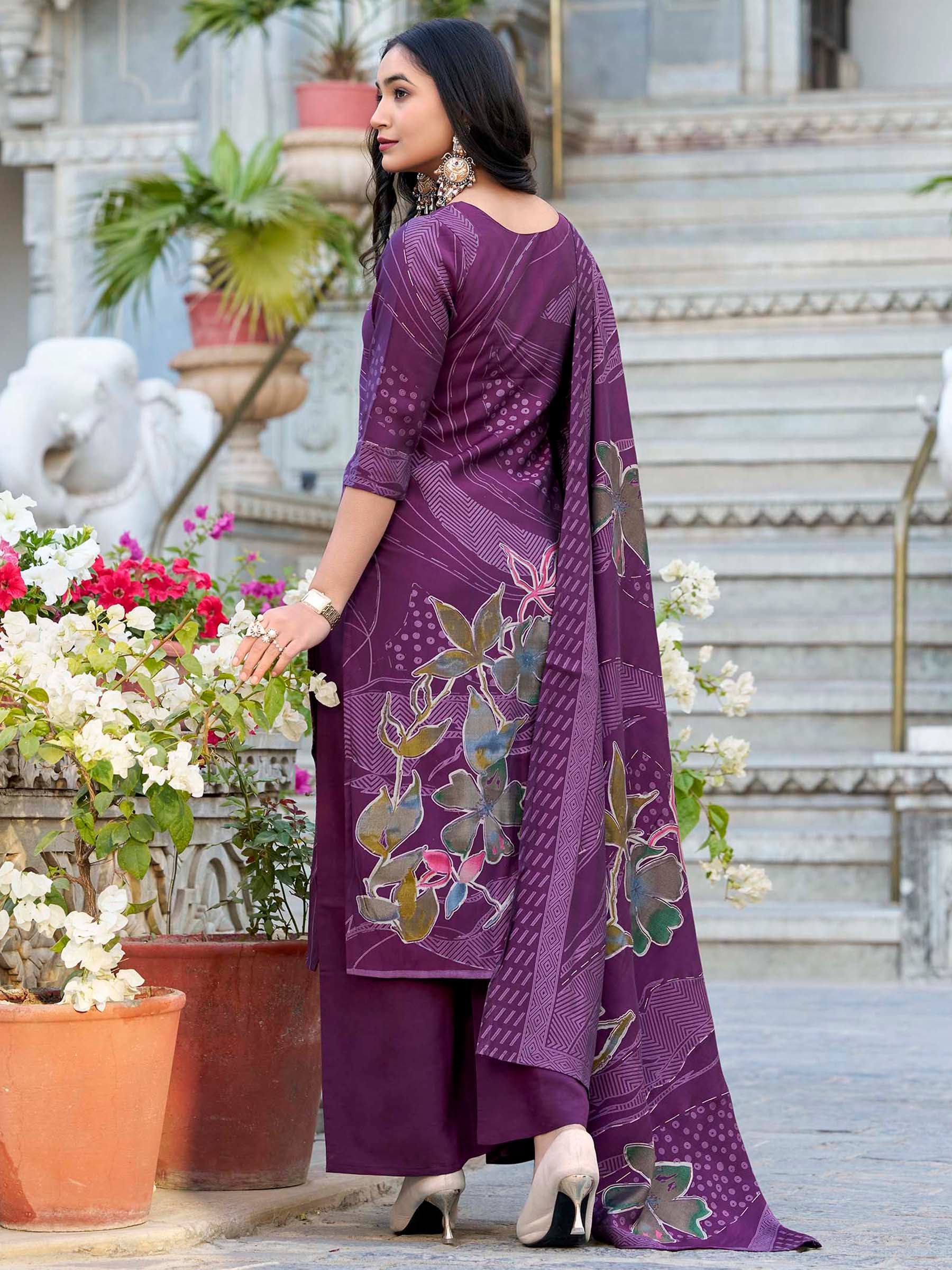 Woman in purple floral printed salwar kameez and dupatta, outdoor ethnic fashion